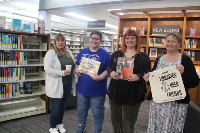 Perry Public Library staff includes, from left, Public Services Librarian Kayla Rothmeyer, Youth Services Librarian Laura Pieper, Adult Services Librarian Mindy Farmer and Library Director Misty VonBehren.