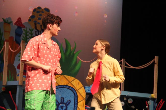 Riley Sergent and Alexa Nelson perform a scene from “The SpongeBob Musical.”