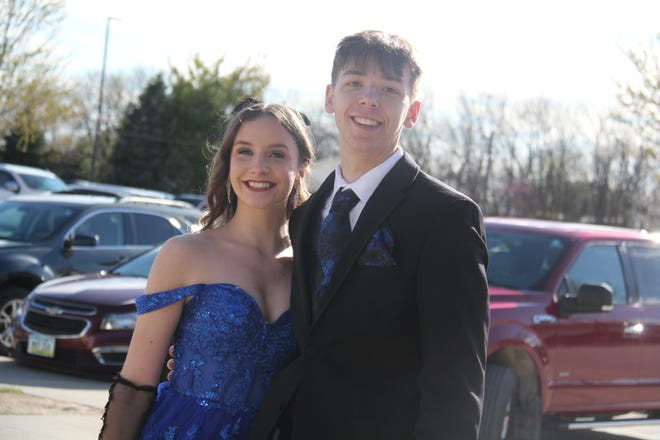 Maddie Airhart and Hayden Farmer pose for a photo before the start the prom grand march on Saturday, April 22, 2023, in the Woodward-Granger High School gym.