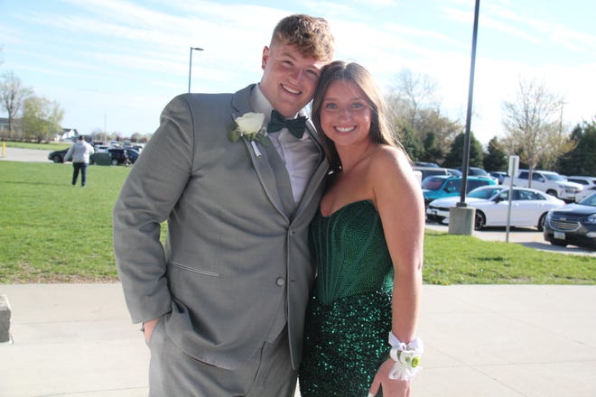 Kaden Seeman and McKenna Carroll pose for a photo before the start the prom grand march on Saturday, April 22, 2023, in the Woodward-Granger High School gym.