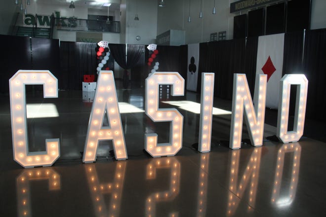 Woodward-Granger's 2024 prom grand march features a "Las Vegas Nights" theme.