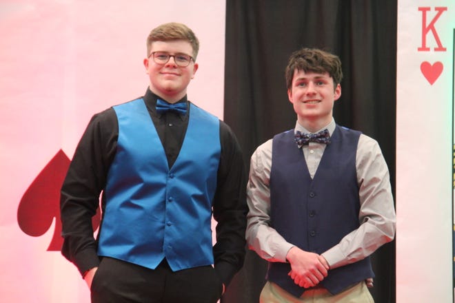 In no order, Cole Peebler and Abel Castro pose for photos during the prom grand march on Friday, April 19, 2024, in the Woodward-Granger High School gym.