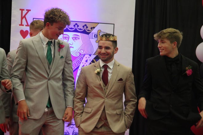 Tanner Ramsey reacts after being crowned the 2024 Woodward-Granger Prom King during grand march on Friday, April 19.