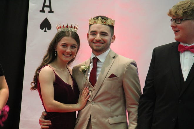 Libby Grell and Tanner Ramsey pose for photos after being crowned the 2024 Woodward-Granger Prom Queen and King during grand march on Friday, April 19.