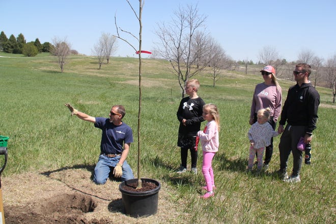 Andy Schmitz, director of horticulture at The Brenton Arboretum, talks about trees during an Earth Day Celebration on Sunday, April 21, 2024, near Dallas Center.