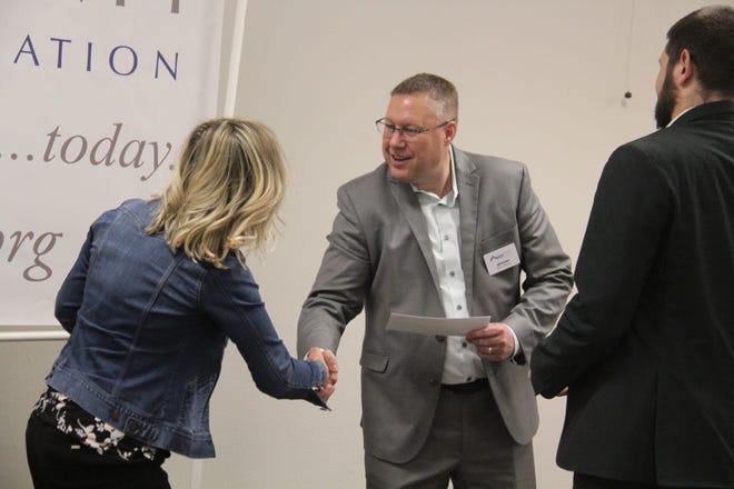 Waukee Institute Leadership Class receives a Dallas County Foundation grant during a presentation on Tuesday, April 23, 2024, at the Granger Community Center.