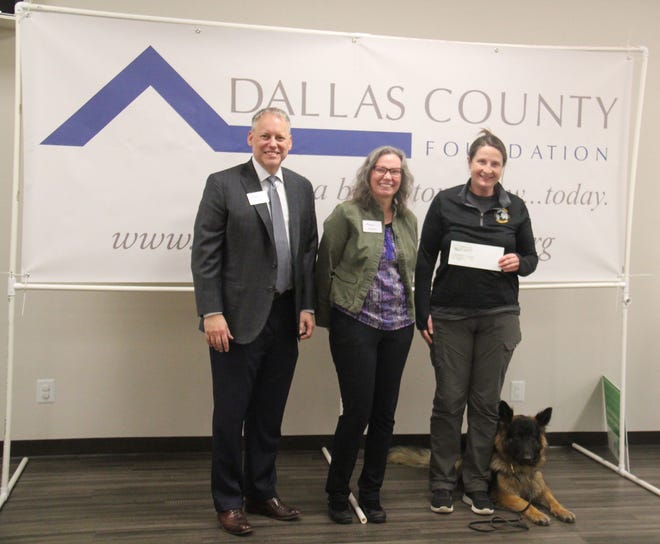 Crisis Canines of the Midlands receives a Dallas County Foundation grant during a presentation on Tuesday, April 23, 2024, at the Granger Community Center.
