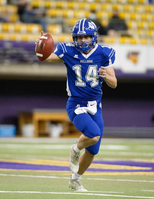 Van Meter junior quarterback Jack Pettit calls out to a receiver in the third quarter against South Central Calhoun in their Class 1A game at the UNI-Dome in Cedar Falls on Saturday, Nov. 14, 2020.