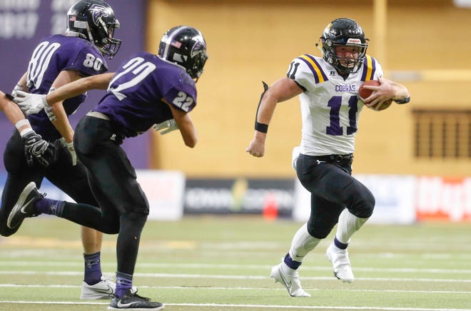 Sigourney-Keota senior running back Sam Sieren runs the ball for a first down in the second quarter against OABCIG in their Class 1A game at the UNI-Dome in Cedar Falls on Saturday, Nov. 14, 2020.