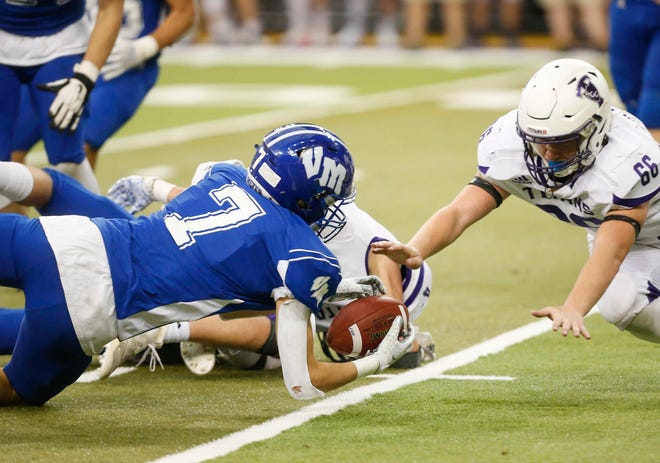 Van Meter junior safety Ganon Archer dives to make an interception in the fourth quarter against South Central Calhoun in their Class 1A game at the UNI-Dome in Cedar Falls on Saturday, Nov. 14, 2020.