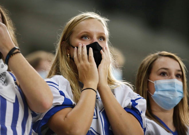 Van Meter fans watch the action in the fourth quarter against South Central Calhoun at the UNI-Dome in Cedar Falls on Saturday, Nov. 14, 2020.