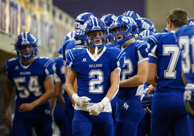 Van Meter senior safety Alex Jones celebrates after pulling down an interception in the third quarter against South Central Calhoun in their Class 1A game at the UNI-Dome in Cedar Falls on Saturday, Nov. 14, 2020.