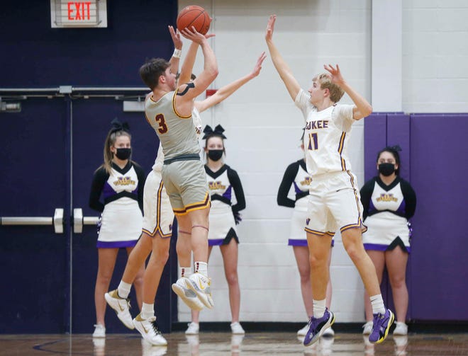 Ankeny senior guard Matt Stueckradt fires a three-point field goal in the first quarter against Waukee during the Class 4A regional final on Tuesday, March 2, 2021.