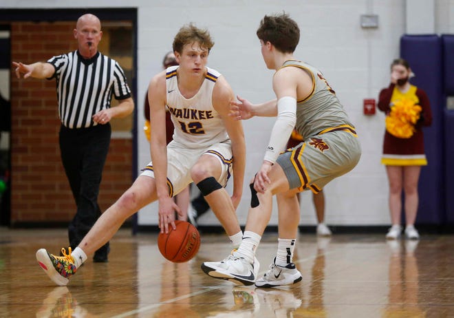 Waukee senior guard Tucker DeVries moves the ball upcourt in the fourth quarter against Ankeny during the Class 4A regional final on Tuesday, March 2, 2021.