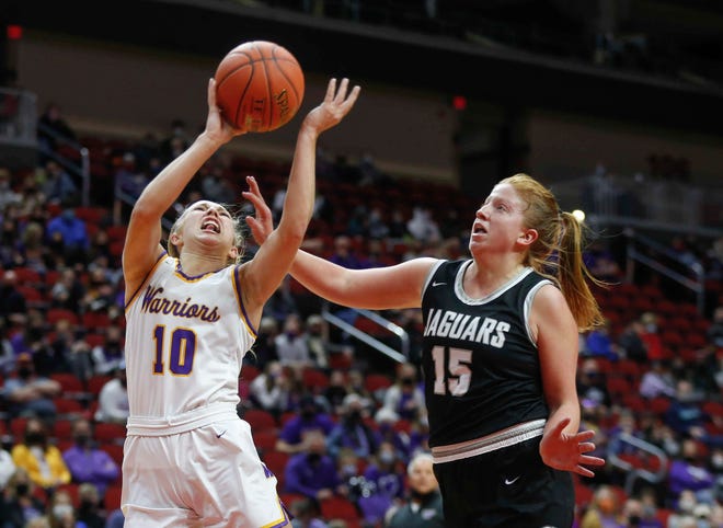 Waukee senior guard Katie Dinnebier, left, is fouled by Ankeny Centennial's Jackie Pippett in the third quarter on Thursday, March 4, 2021, during the Iowa high school girls state basketball tournament at Wells Fargo Arena in Des Moines.