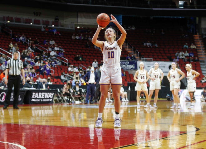 Waukee senior guard Katie Dinnebier shoots a free throw after being fouled by Ankeny Centennial's Jackie Pippett in the third quarter on Thursday, March 4, 2021, during the Iowa high school girls state basketball tournament at Wells Fargo Arena in Des Moines.
