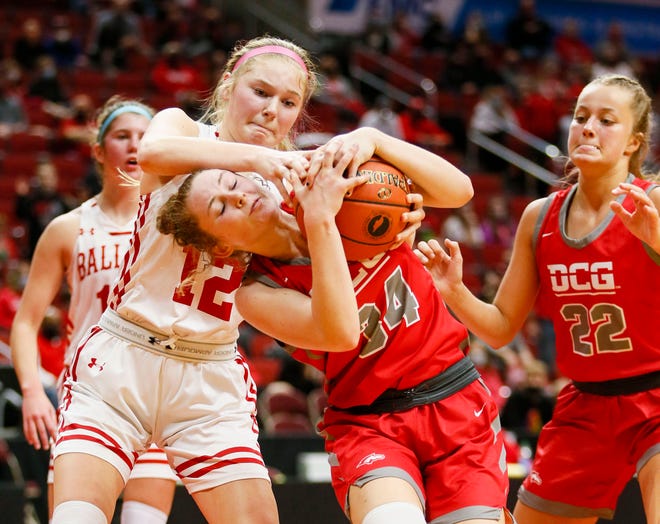 Ella Lampe of Dallas Center Grimes and Meg Rietz of Ballard fight for the ball during the 4A semifinals game Thursday, March 4, 2021.